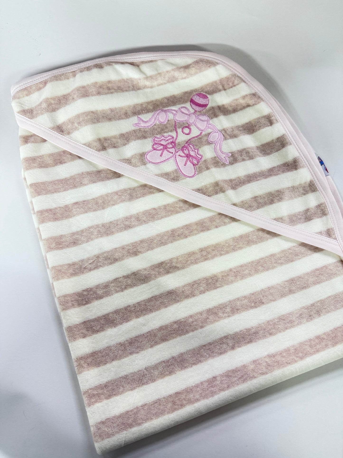 Rattle embroidered blanket