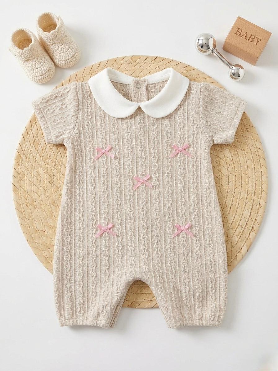 Blush Bow knit romper