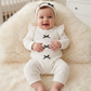 Lumi Bow romper
